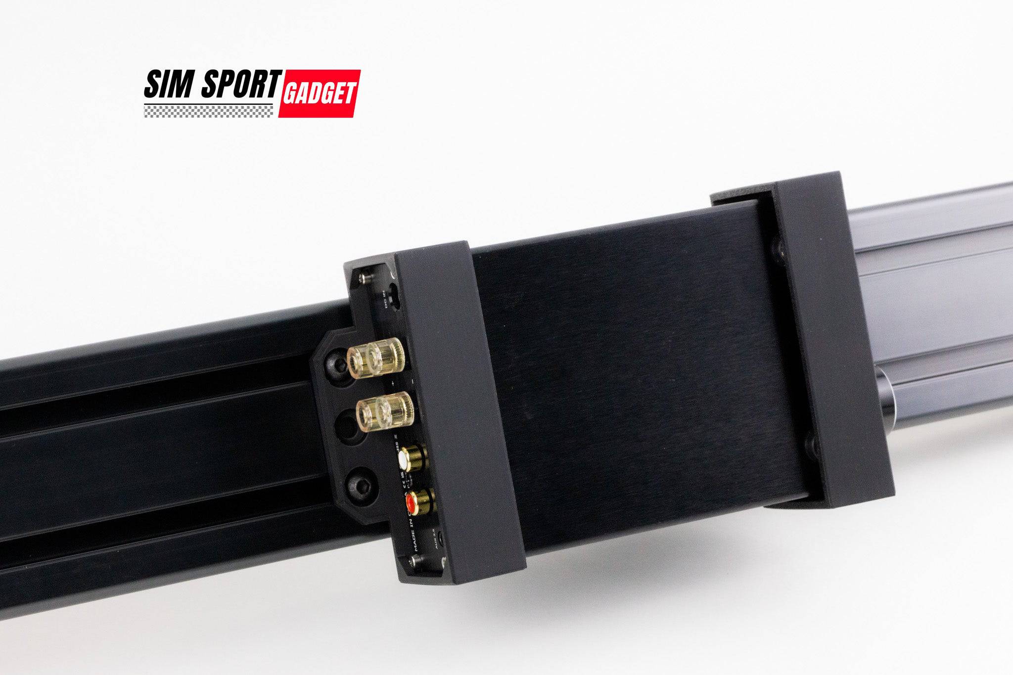 SimSportGadget AIYIMA A07 amplifier bracket mounted on a sim racing aluminum rig for power brick support.