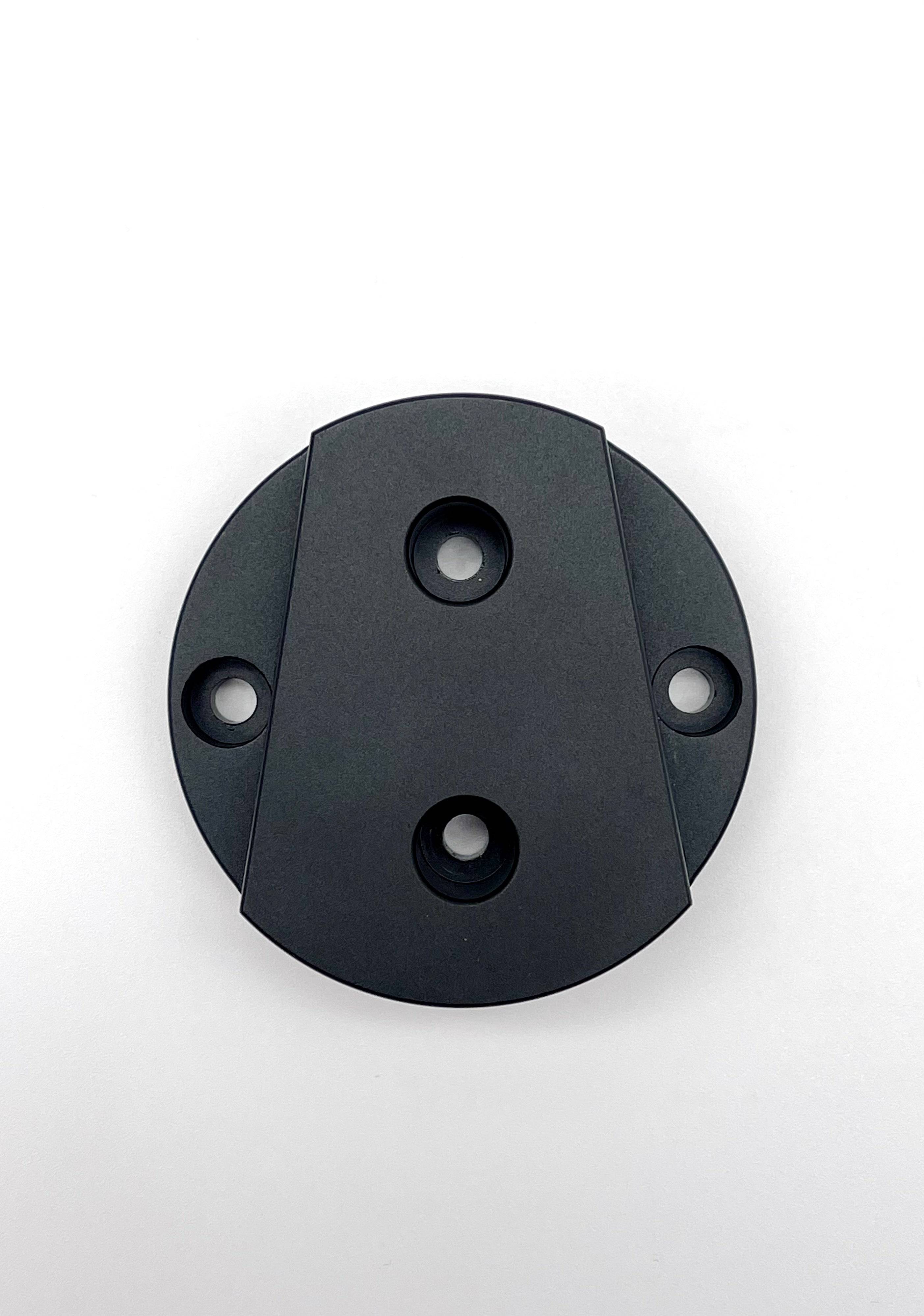 Apex Sim Racing Simucube 2 steering wheel wall mount accessory mounted on a wall for easy setup and organization.