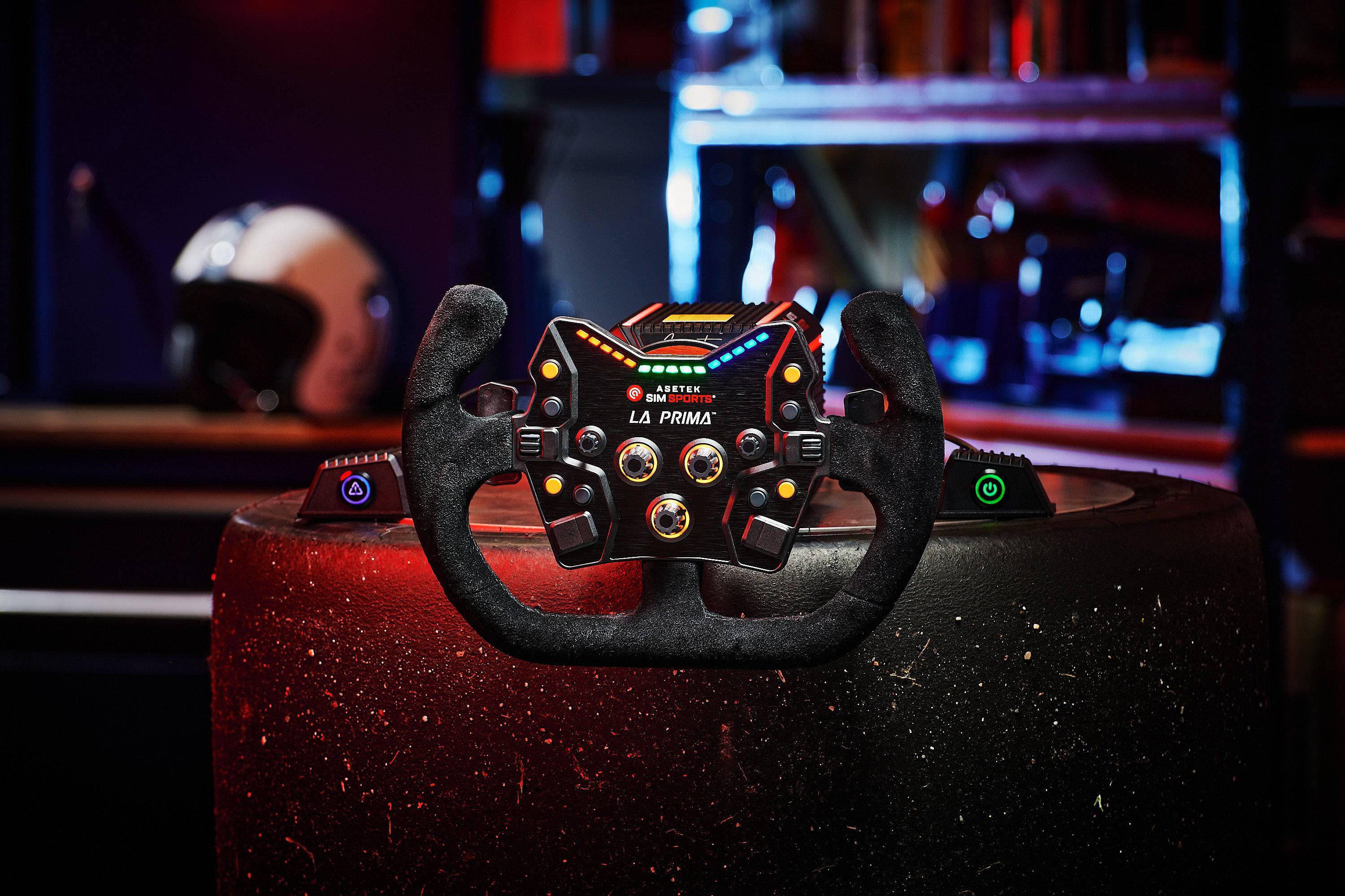 Asetek SimSports La Prima Button Box wheel rim accessory in black suede with buttons, designed for racing simulation setups.