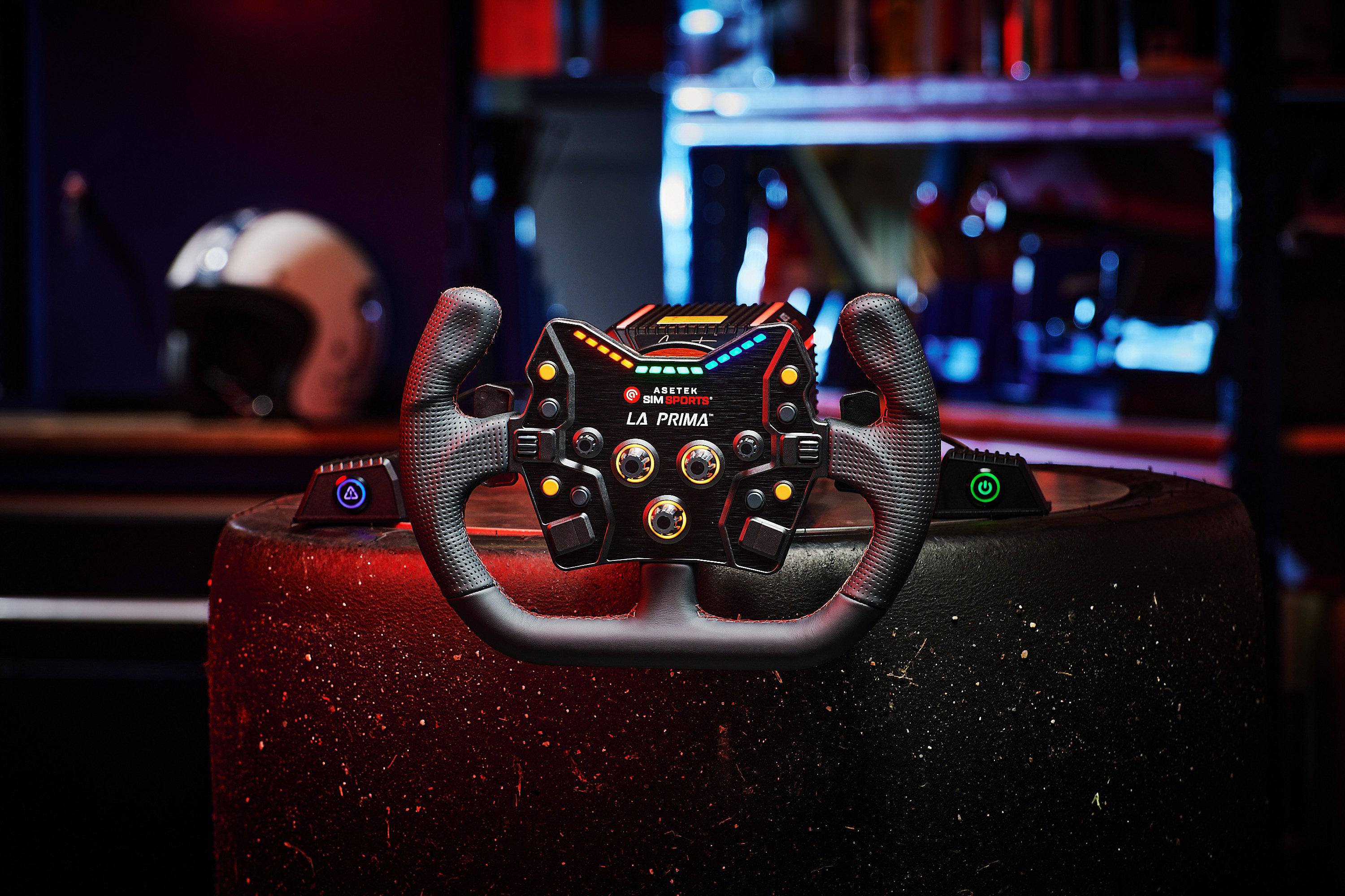 Asetek SimSports La Prima button box with black leather and perforated leather handles, designed as wheel rim accessory.
