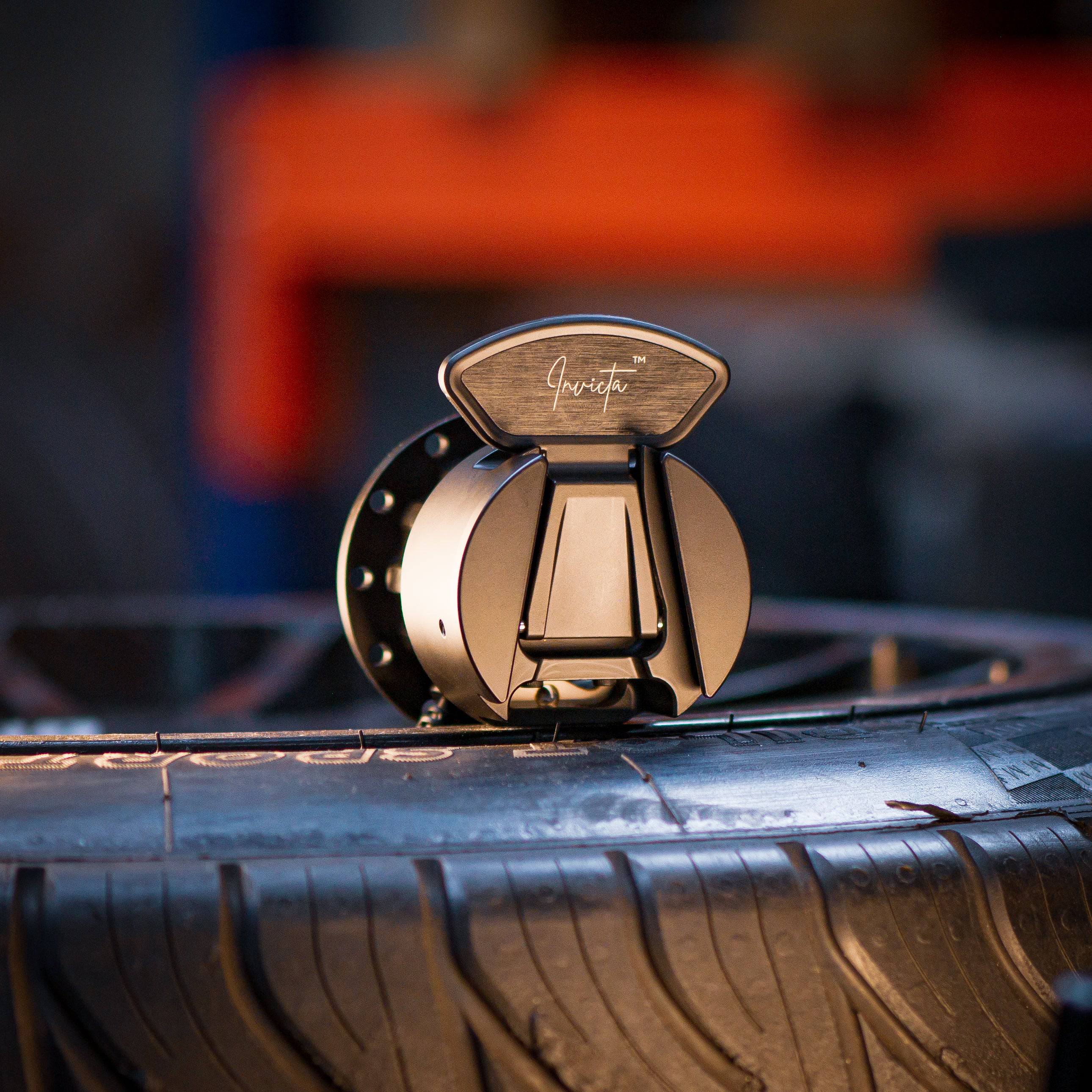 Asetek SimSports Invicta V2 Quick Release Adapter for wheel rim accessories with USB-A connection, black plastic and metal components.