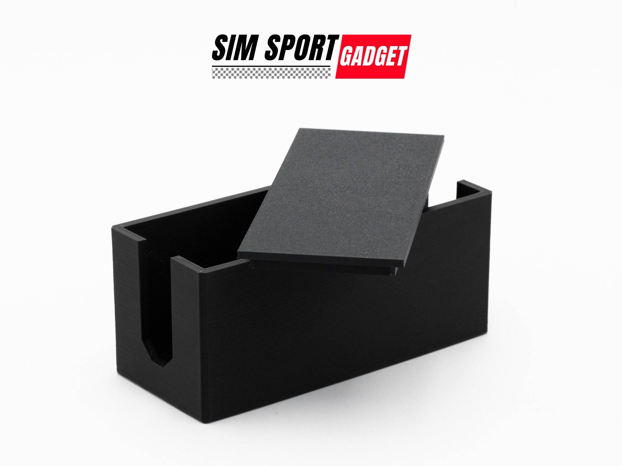 SimSportGadget cable management box for sim racing setups, keeps cables organized and tidy in a sleek black design.