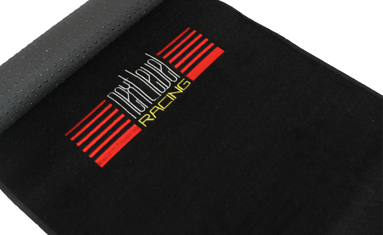 Next Level Racing floor mat accessory designed to protect flooring and enhance stability during racing simulations.