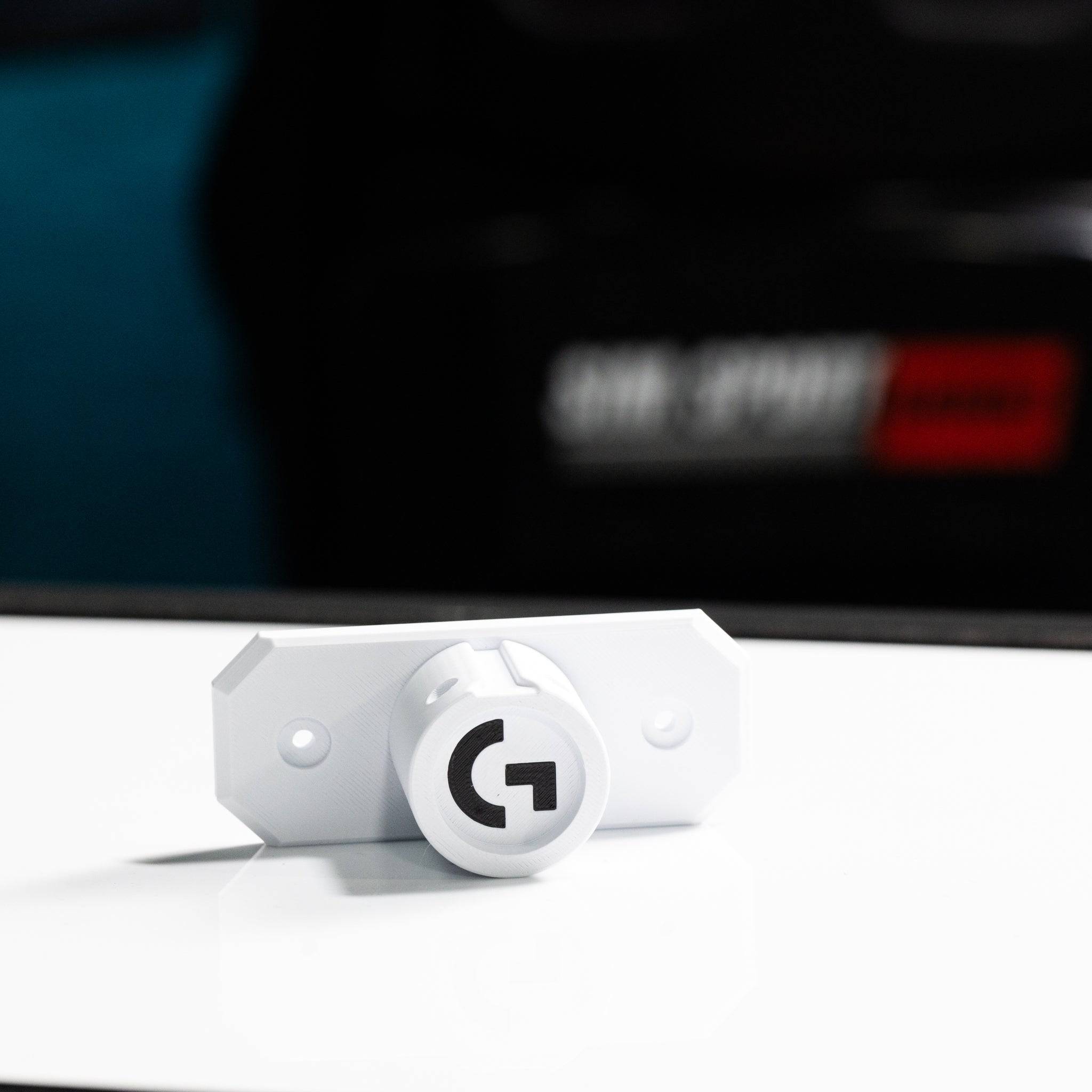 SimSportGadget wheel wall mount for Logitech Pro Quick Release with logo, designed for easy storage and secure attachment.