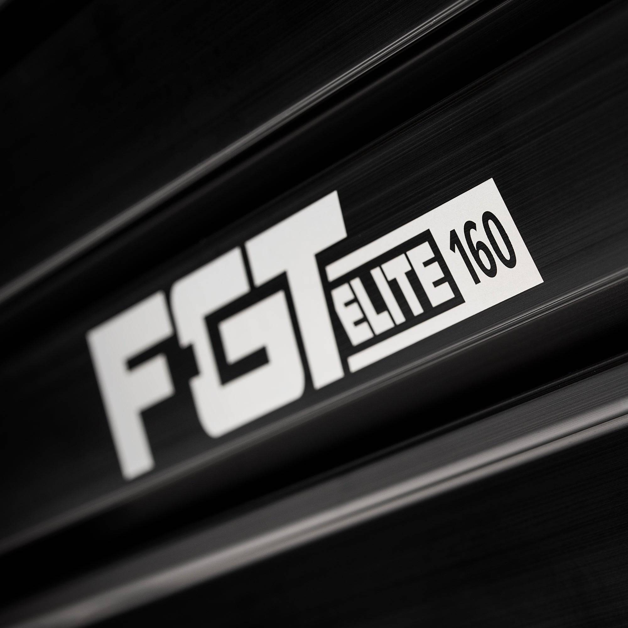 Next Level Racing F-GT Elite sim racing chassis in Scuderia Ferrari edition with red and black design and racing seat.