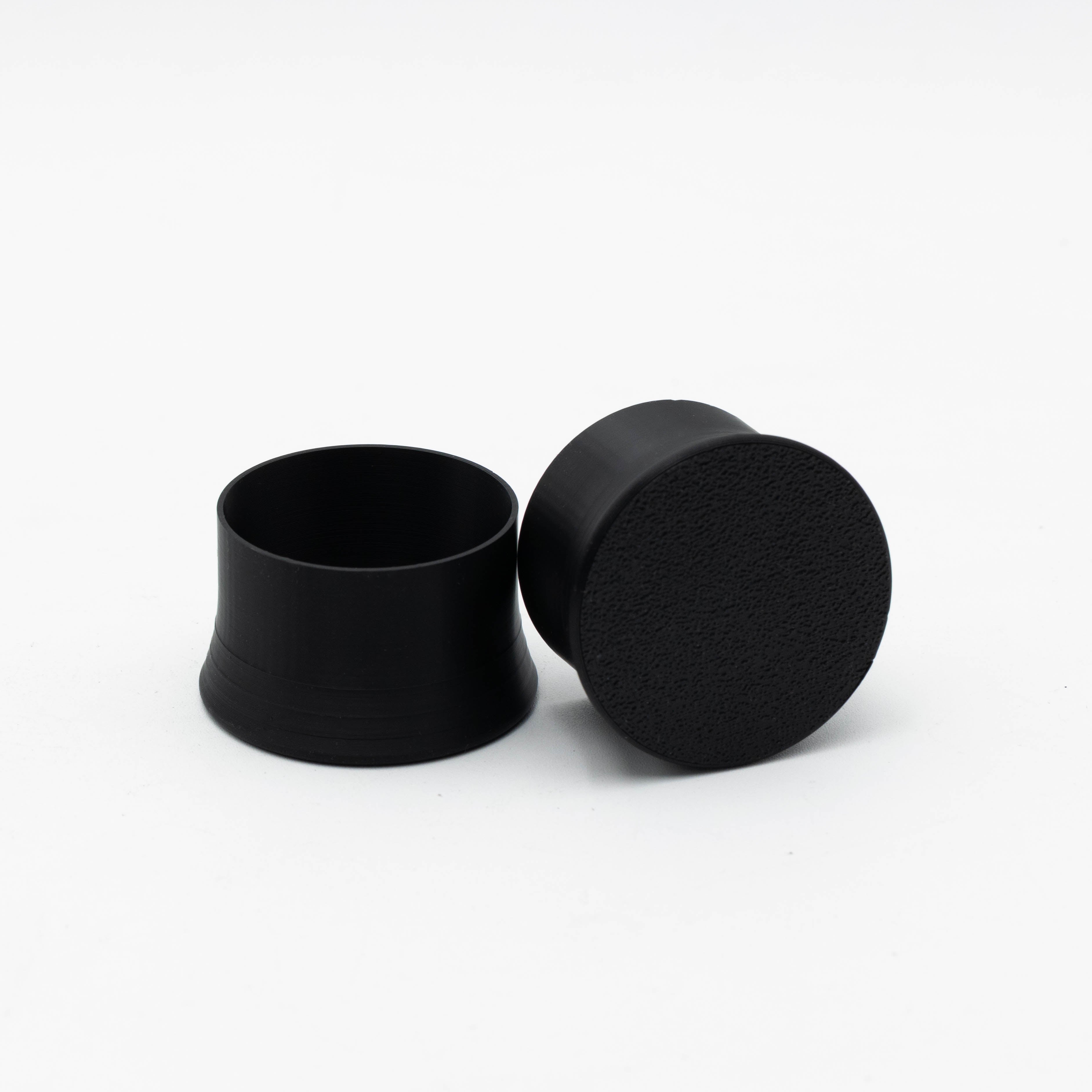Dust cover for NRG wheel base quick release, designed as a accessories mount, by SimSportGadget, shown on NRG style wheel.