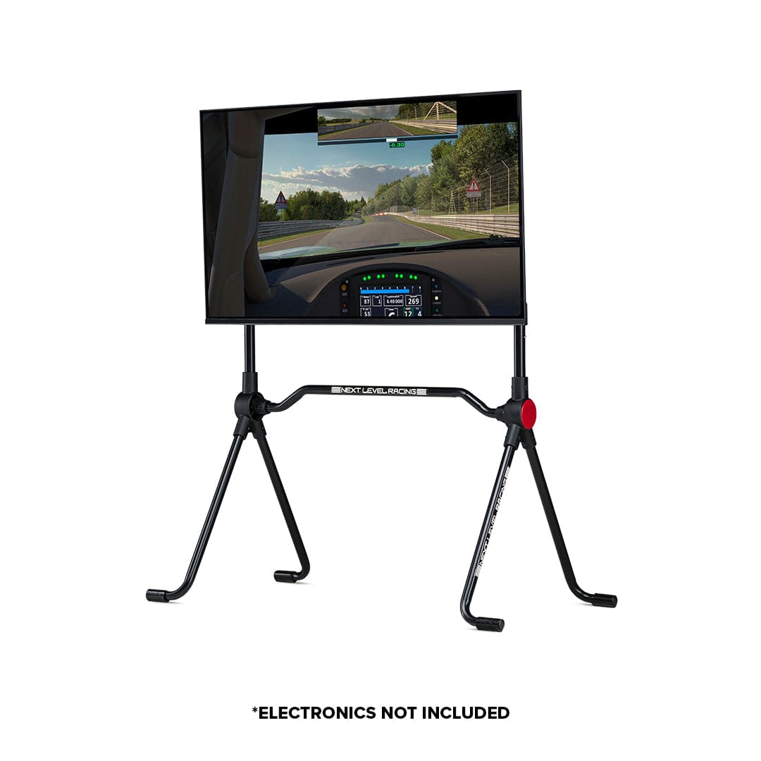 Next Level Racing Lite free-standing monitor stand holding two computer monitors, black metal frame for ergonomic setup.