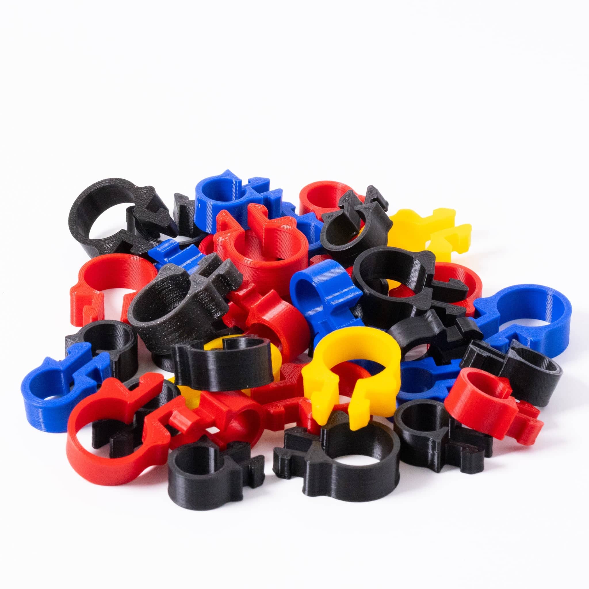 SimSportGadget SNUG Cable Management Clip securing cables in an organized manner on a desk or workspace.