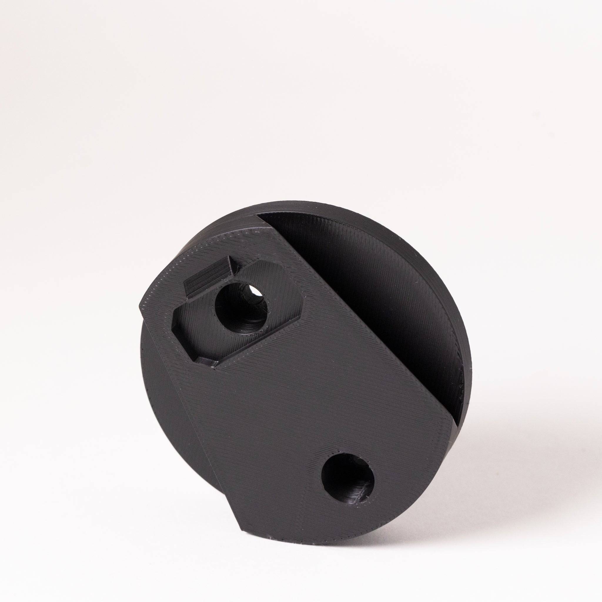 SimSportGadget wheel mount wall bracket for Asetek quick release, securely holding the wheel in place.