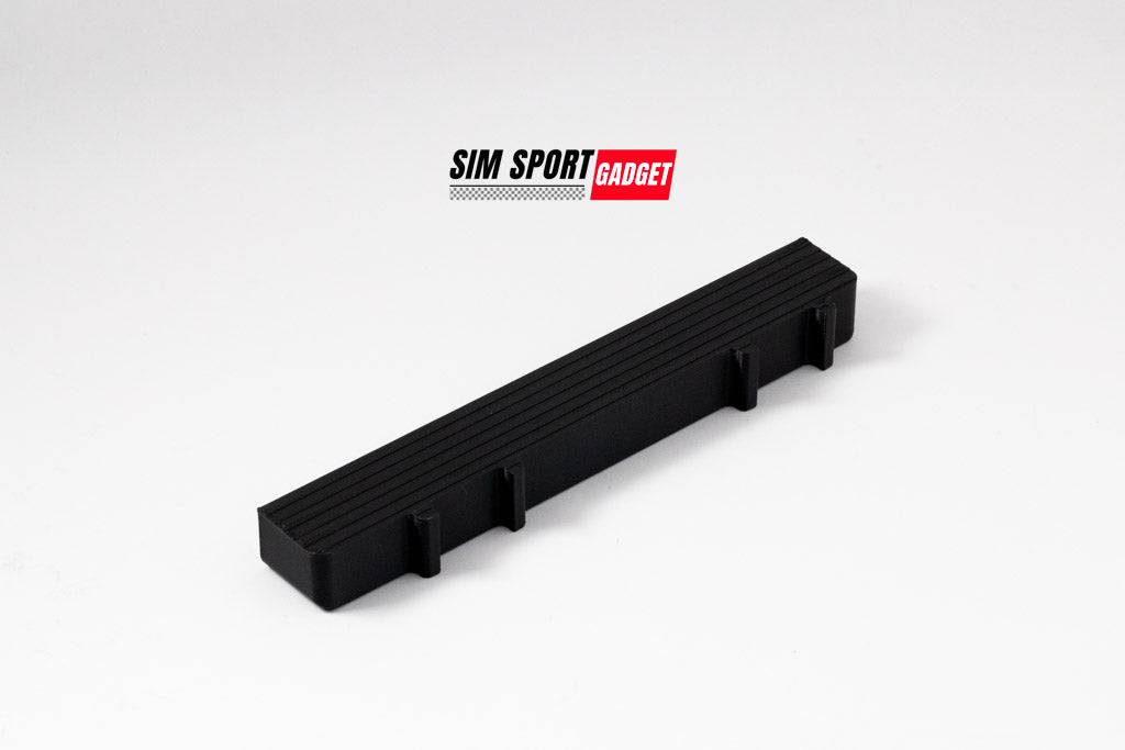 Asetek Invicta Anti-Catch Pedal Mod by SimSportGadget, featuring a white logo on a sleek pedal enhancement for racing simulations.