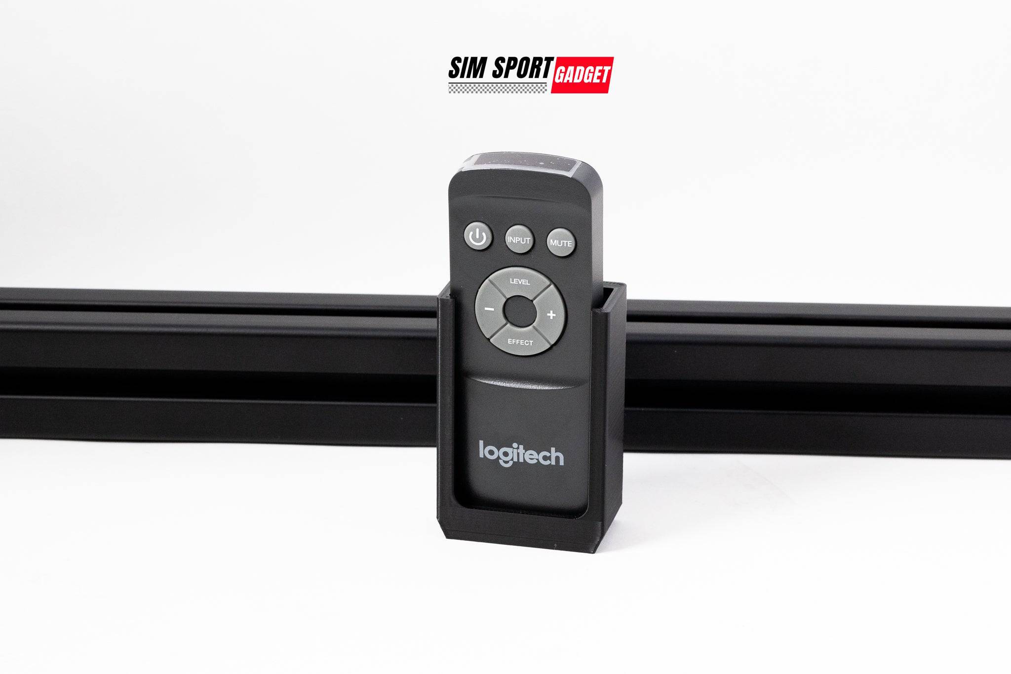 SimSportGadget Logitech Z906 remote mount for sim racing and flight rig accessories, white logo visible on mount.