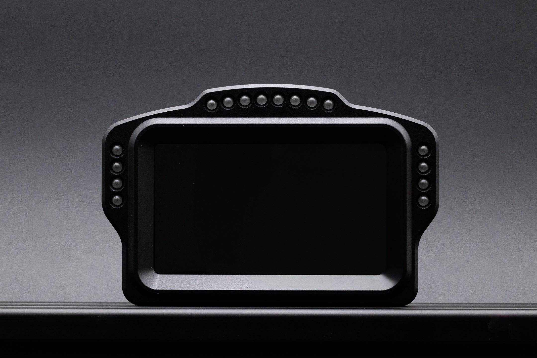 SimSportGadget SSG Dashboard Display DV-5 button box with dashes for racing simulator setups, featuring multiple control buttons.