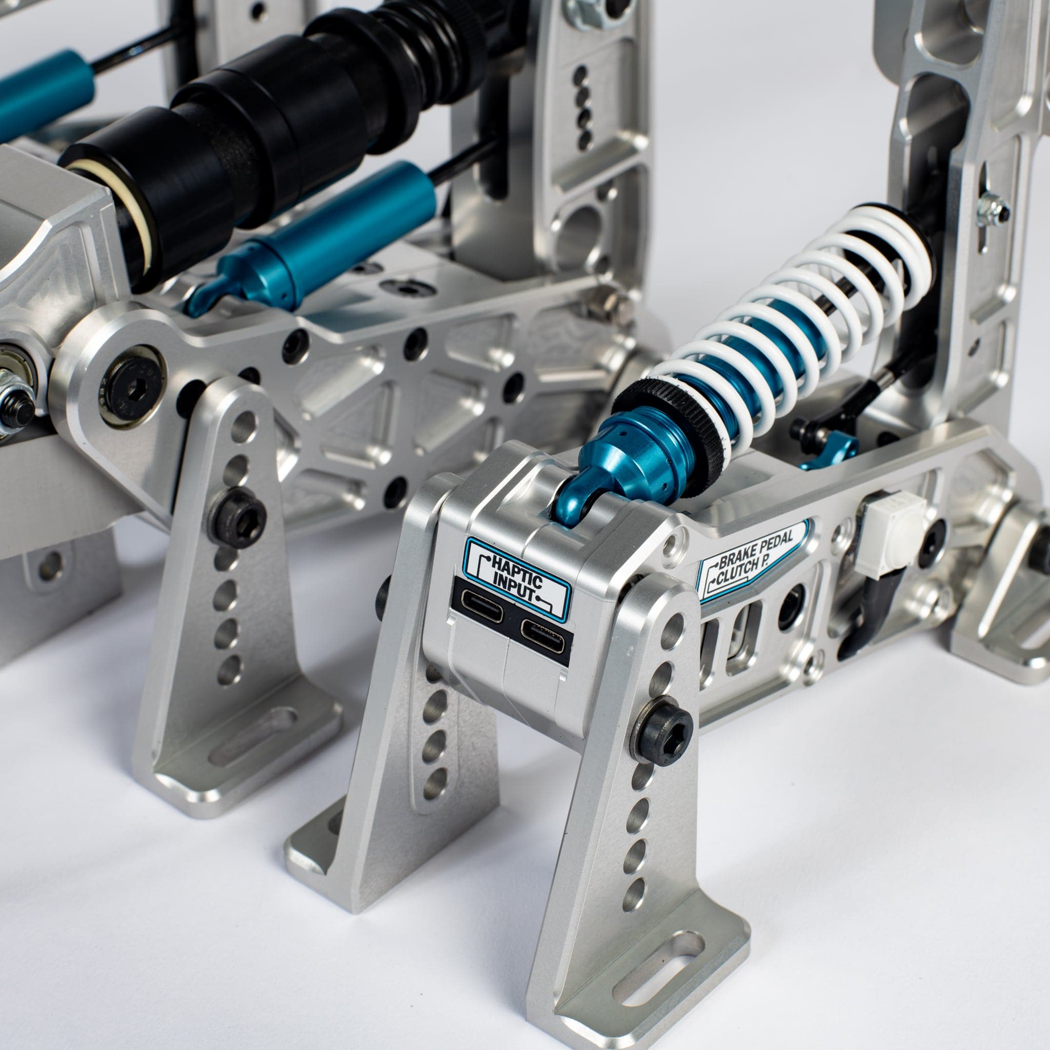 Simtrecs ProPedal GT Mark II pedal set with textured foot surfaces and adjustable pins for enhanced grip and control.