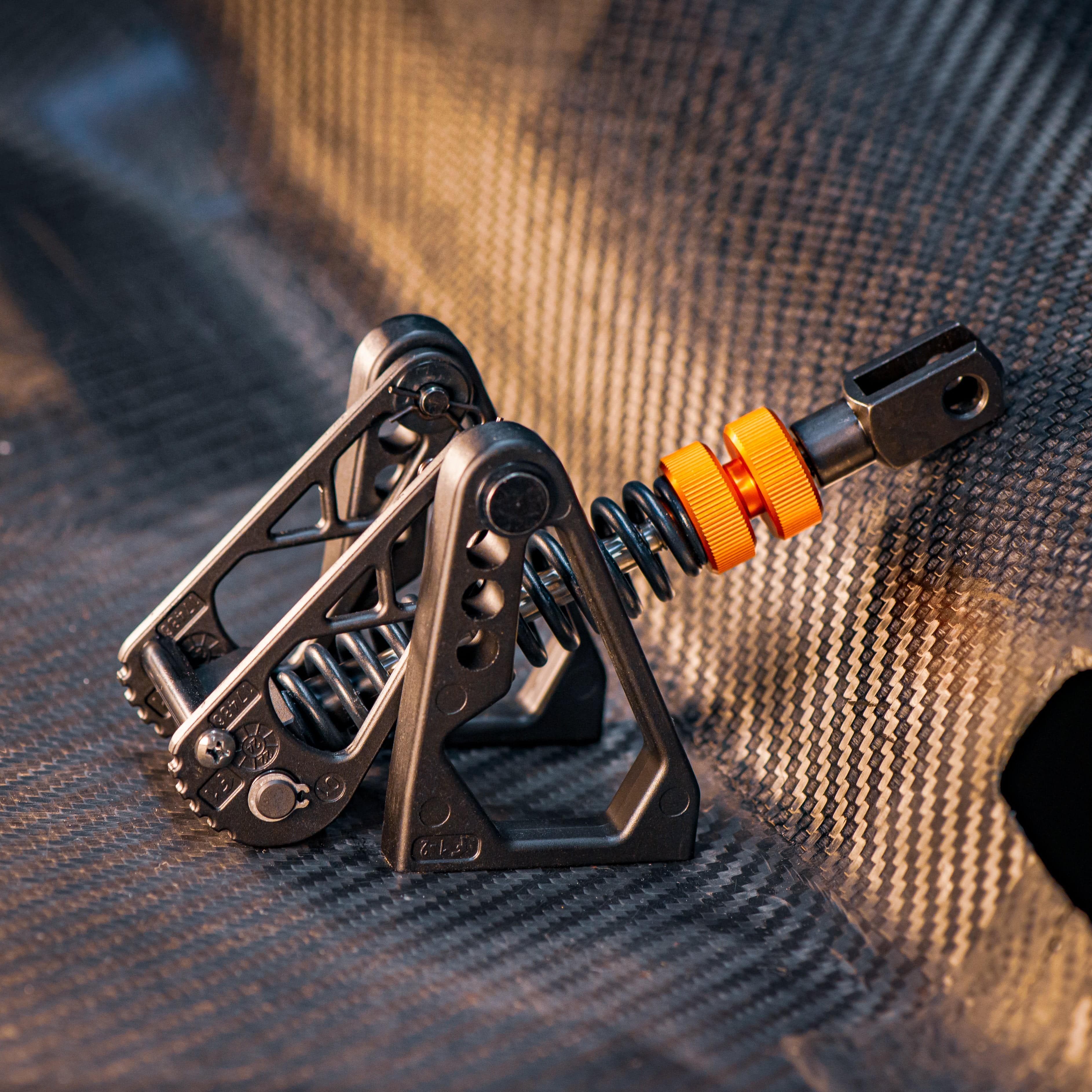 Asetek SimSports La Prima and Invicta clutch upgrade kit for pedal set, featuring metal components and detailed assembly parts.