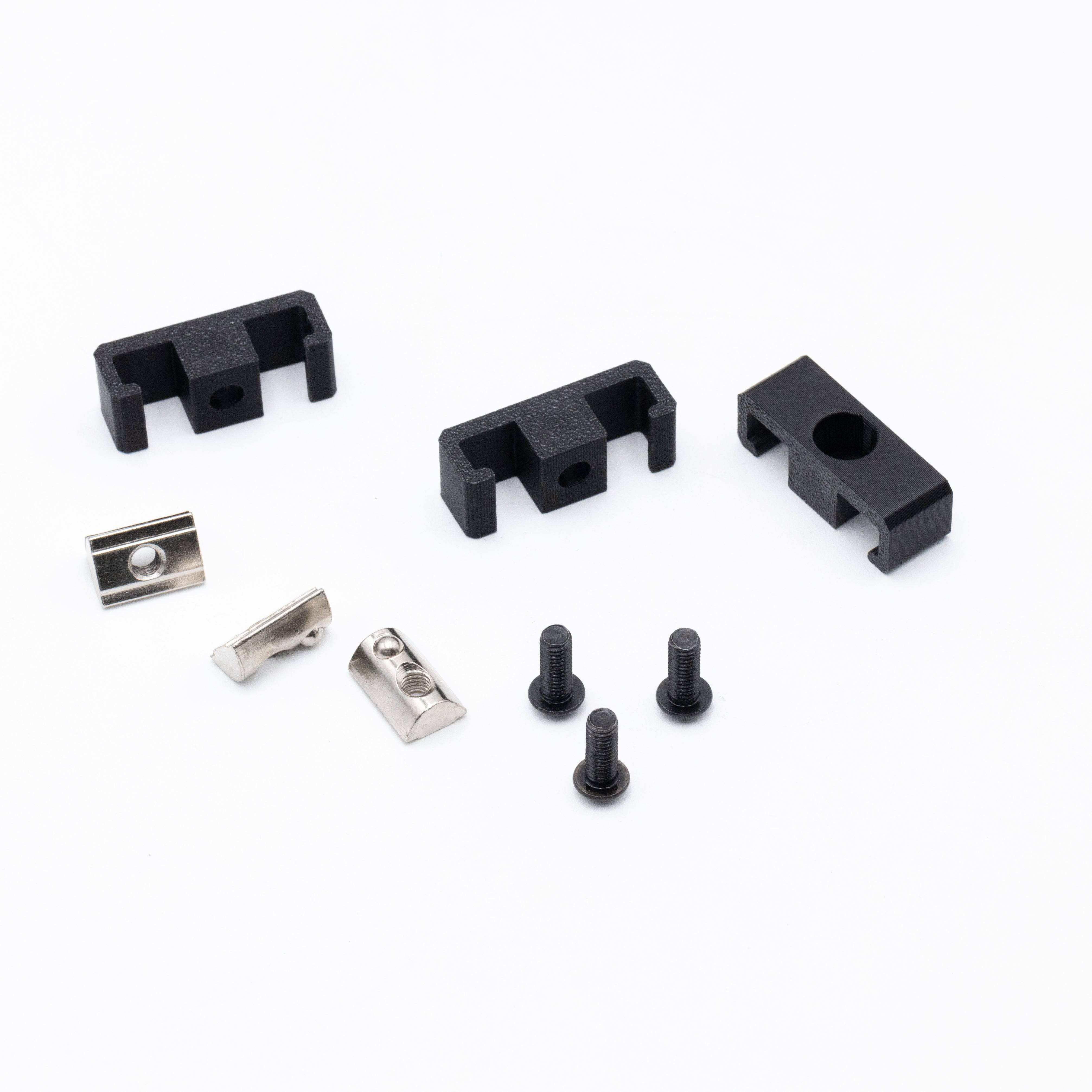 SimSportGadget bolt-in style cable management clips showing secure plastic clips for organizing cables.