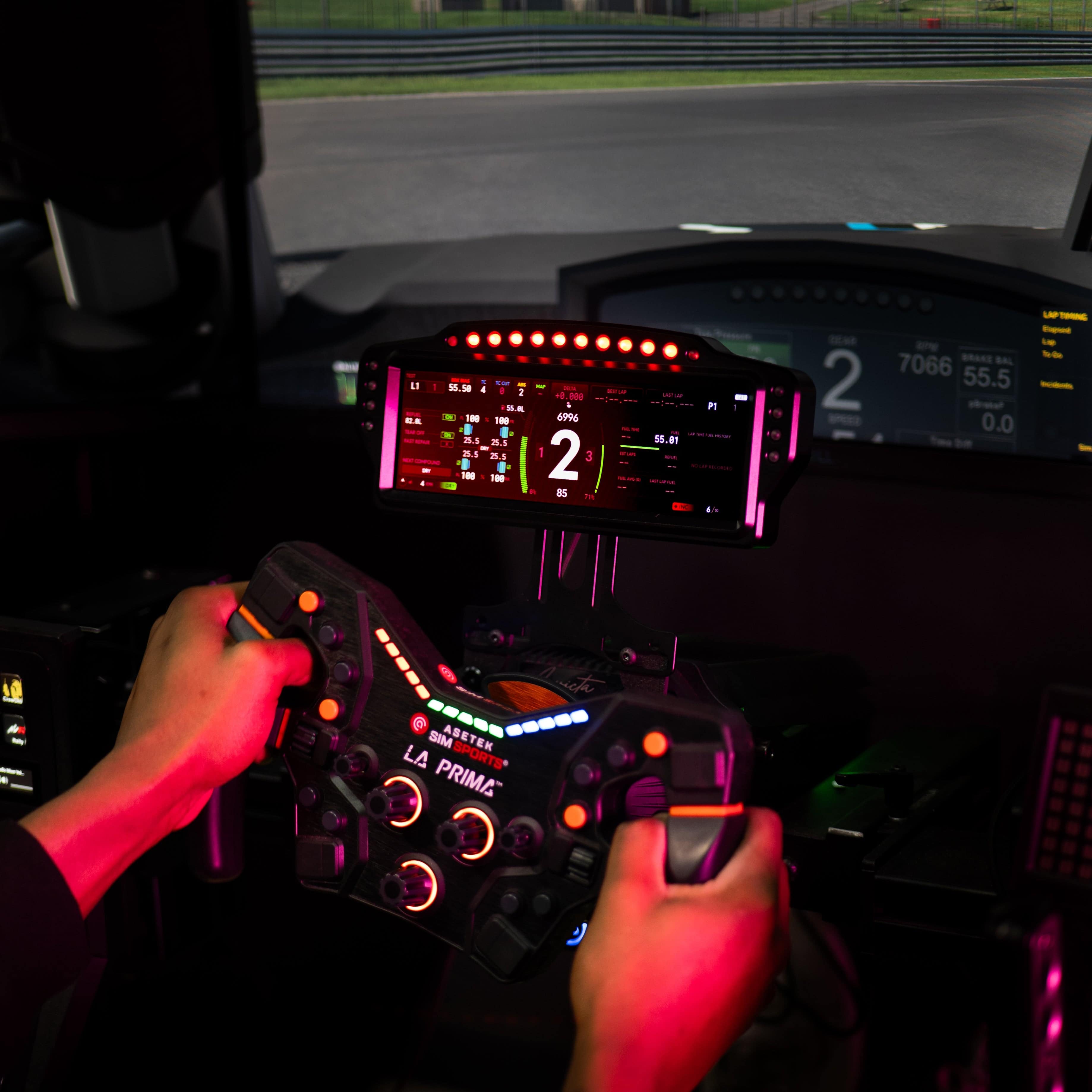 Electronic SSG Dashboard Display DV-8 by SimSportGadget showing digital readouts on a sleek electronic device.