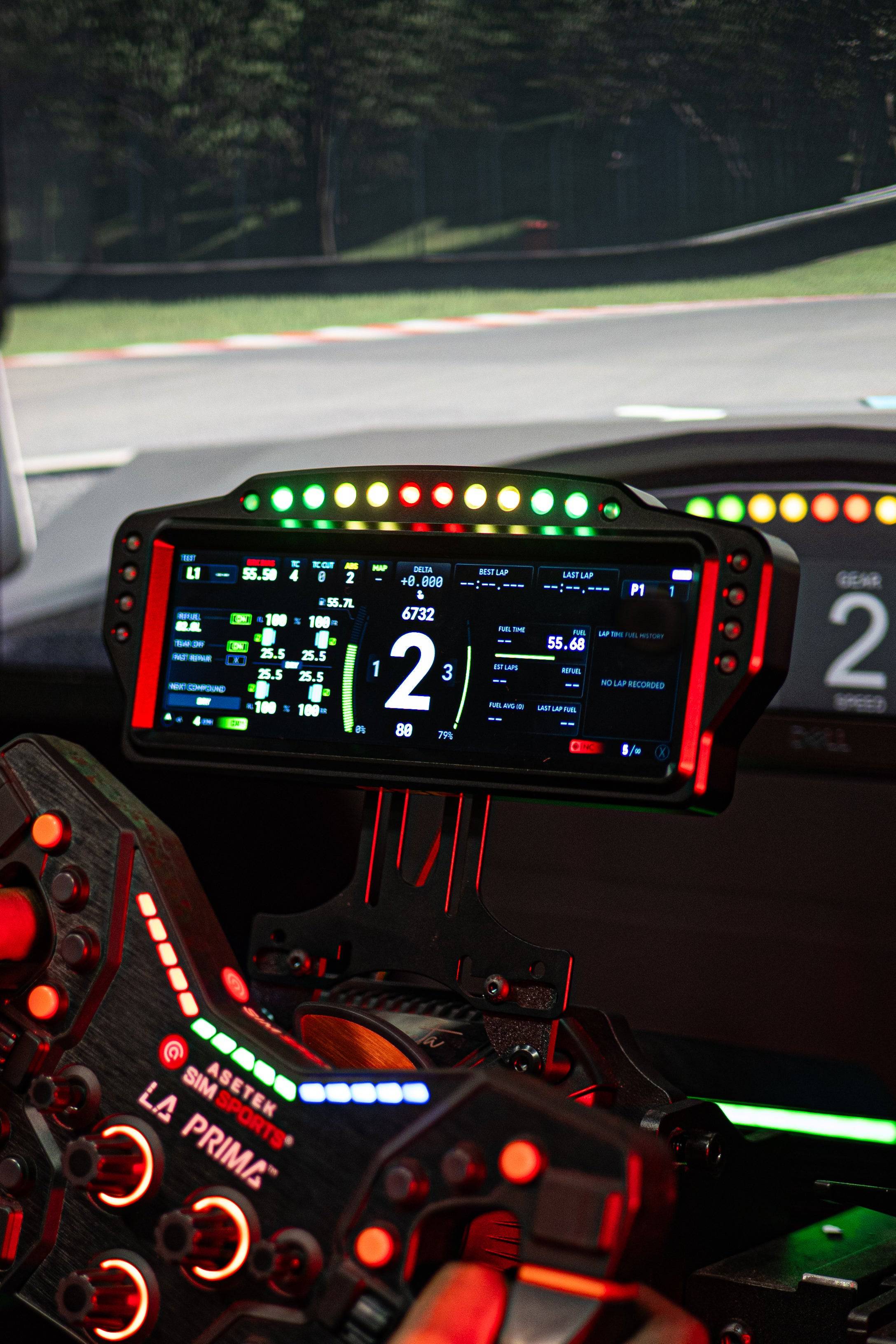Electronic SSG Dashboard Display DV-8 by SimSportGadget showing colorful digital readouts and control buttons.