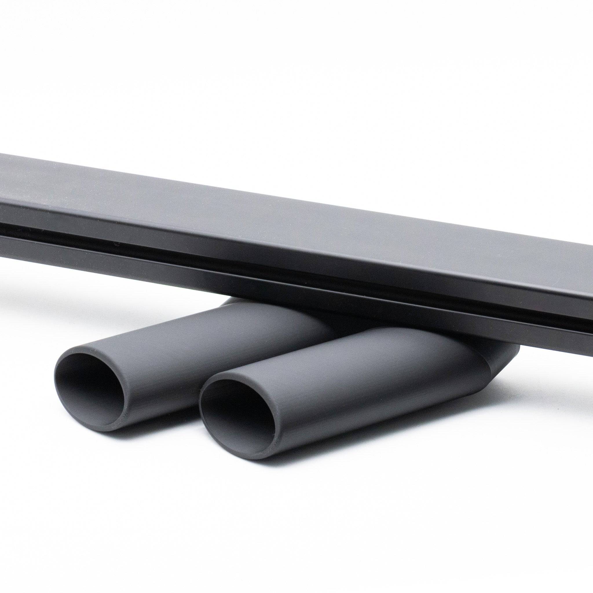Pair of faux slanted exhaust pipes accessories from SimSportGadget, showcasing metallic finish and angled design for car detailing.