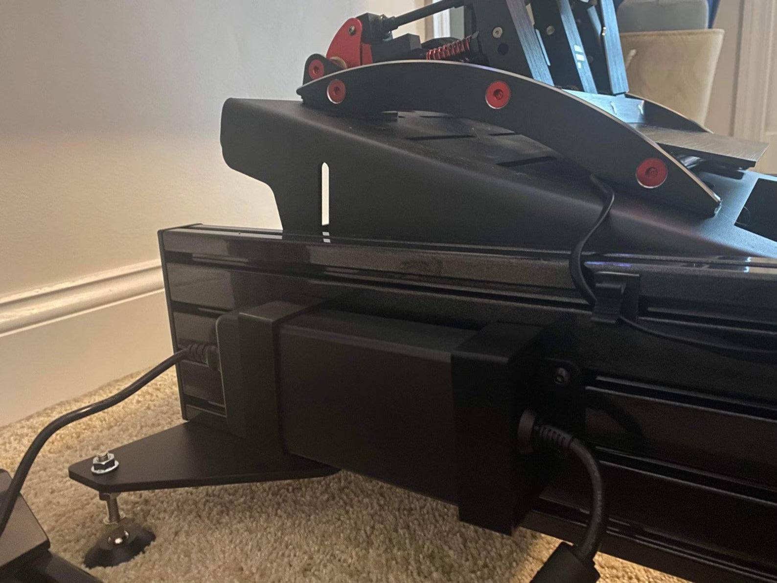 SimSportGadget power supply bracket for Fanatec Clubsport V2.5, designed to securely hold the power brick for racing sim accessories.