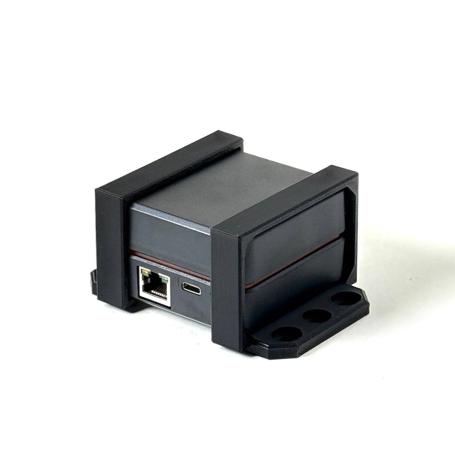 Simucube Link Hub mount power brick bracket by SimSportGadget, showing sturdy black metal design for secure attachment.
