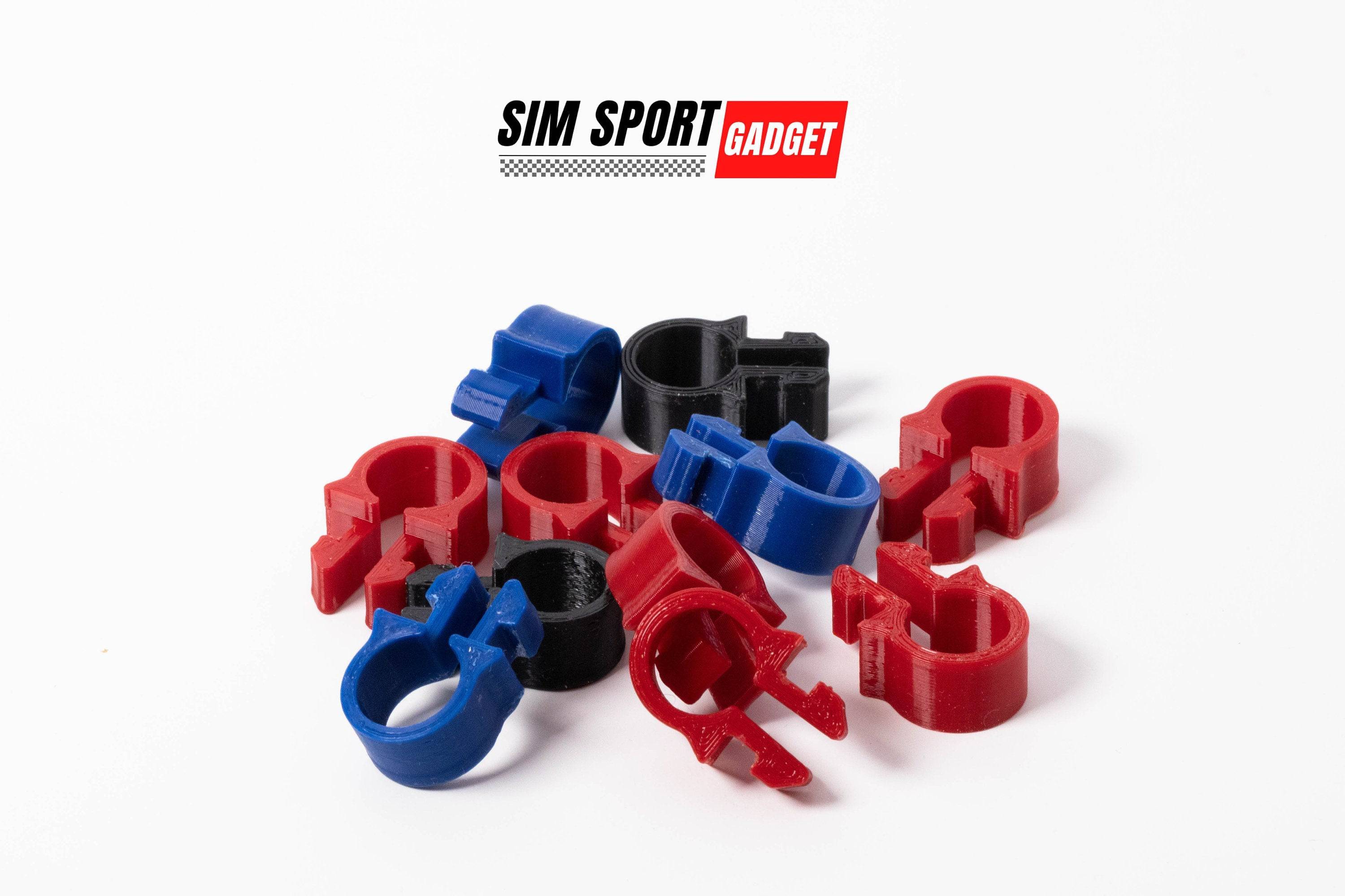 SimSportGadget SNUG Cable Management Clip holding and organizing cables neatly in a close-up view.