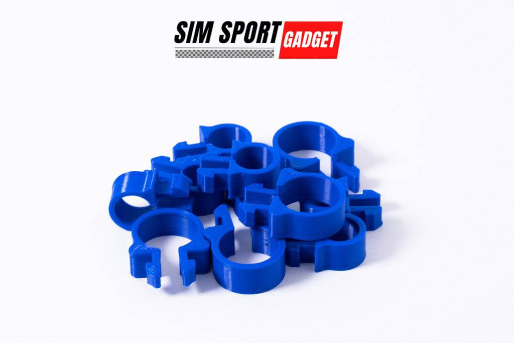 SimSportGadget cable management clip for 1515 rigs, helps organize and secure cables efficiently in gaming or tech setups.