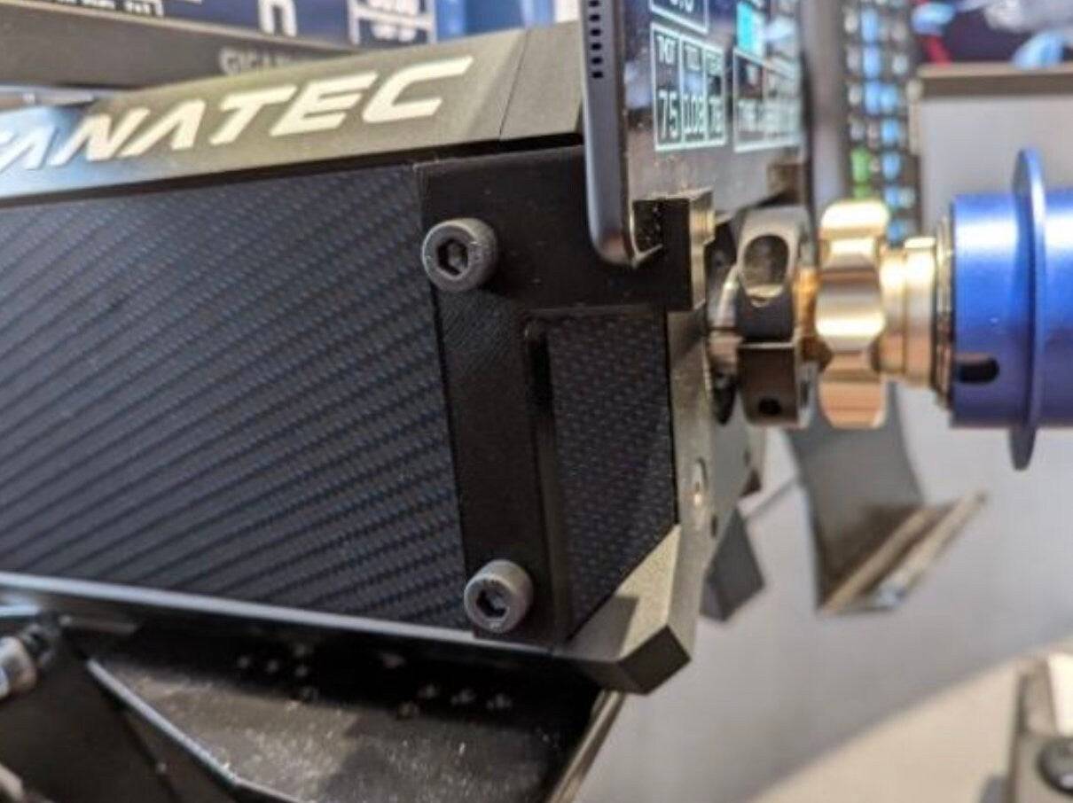 SimSportGadget Fanatec DD1/DD2 tablet holder accessory mount attached to racing wheel setup.