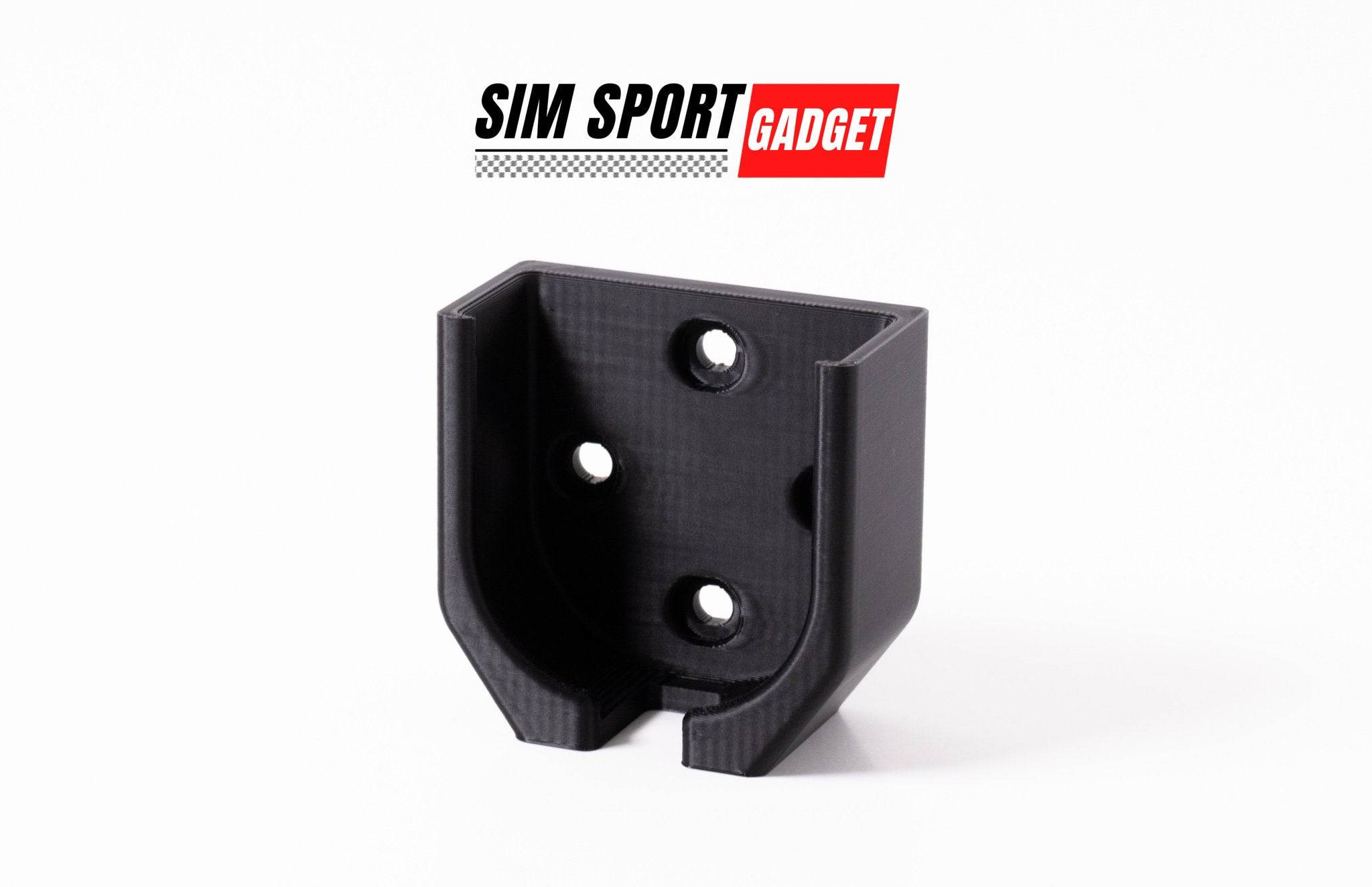 SimSportGadget Buttkicker remote mount accessory attached to gaming setup for vibration effects.