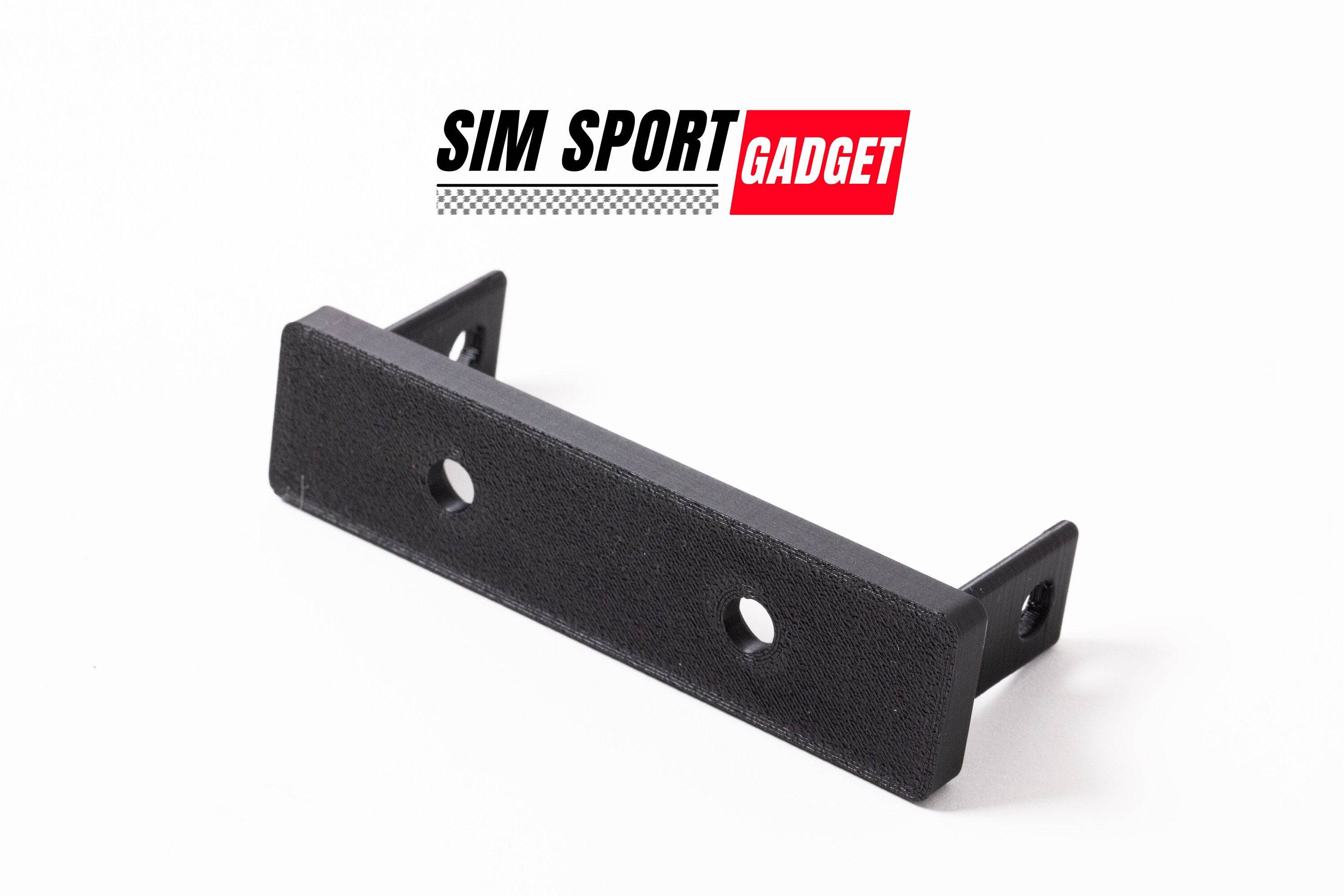 SimSportGadget Fanatec Emergency Stop Mount accessory securely attached to sim racing setup for quick access.