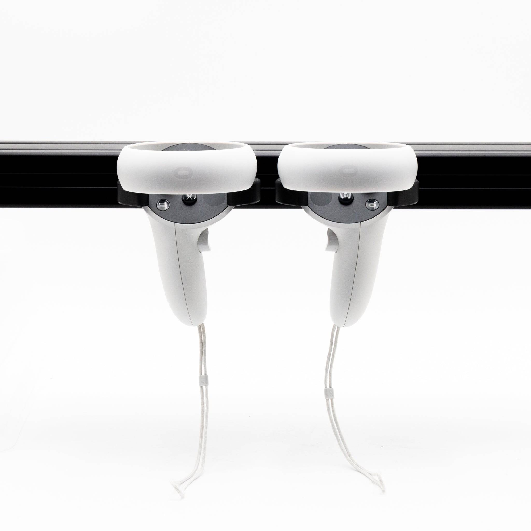 Pair of SimSportGadget Oculus Quest 2 controller mounts, adjustable accessories holders for secure VR controller storage.