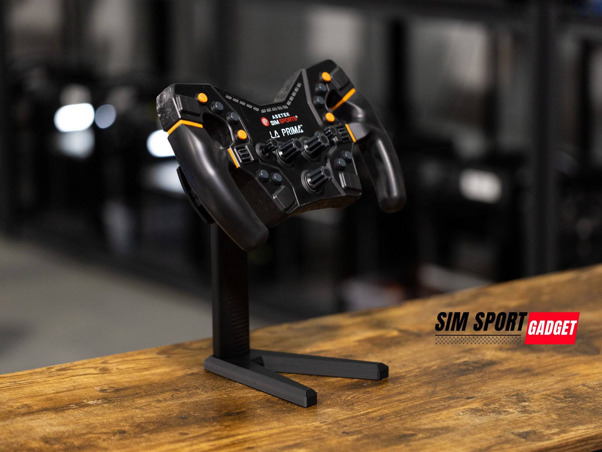 SimSportGadget wheel display stand for sim racing steering wheels, showcasing a sturdy metal frame and adjustable mounting options.