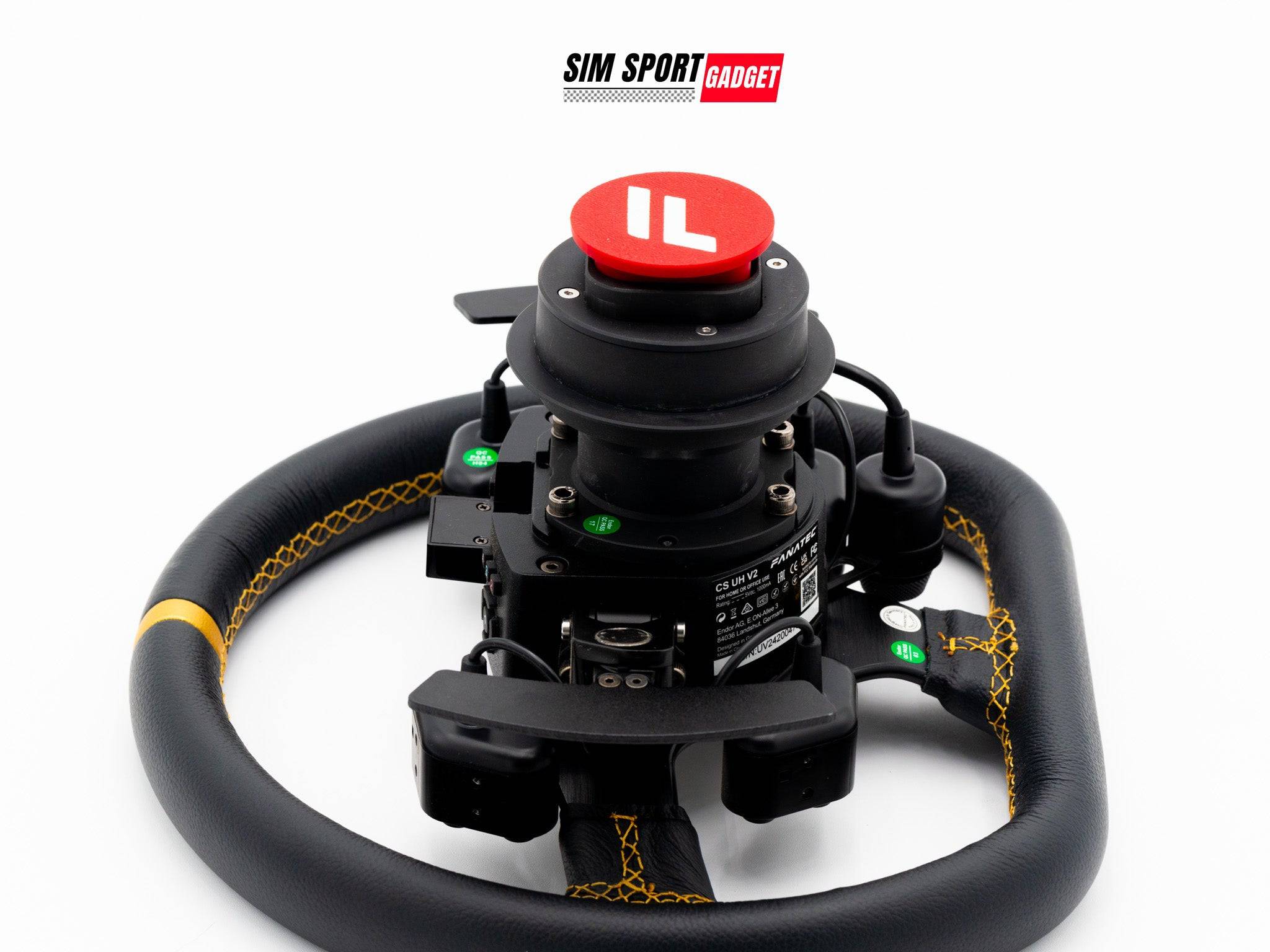 SimSportGadget Fanatec QR2 wheel side dust cover on a wooden surface, protecting the wheel from dust and debris.