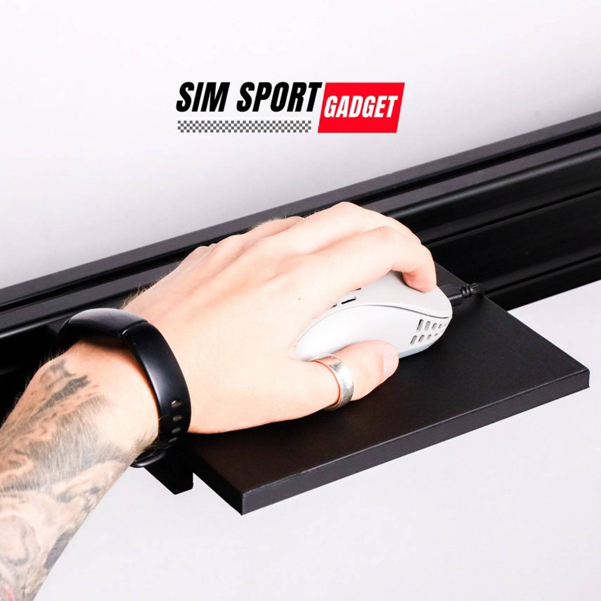 SimSportGadget sim racing mouse pad accessory with textured surface designed for precise control on a racing rig.