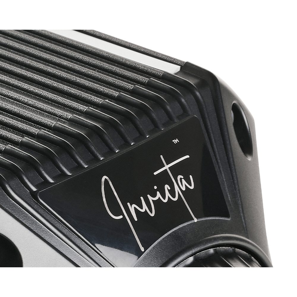 Close-up of Asetek SimSports Invicta Direct Drive Wheelbase showing the sleek design and control panel with 27Nm torque.