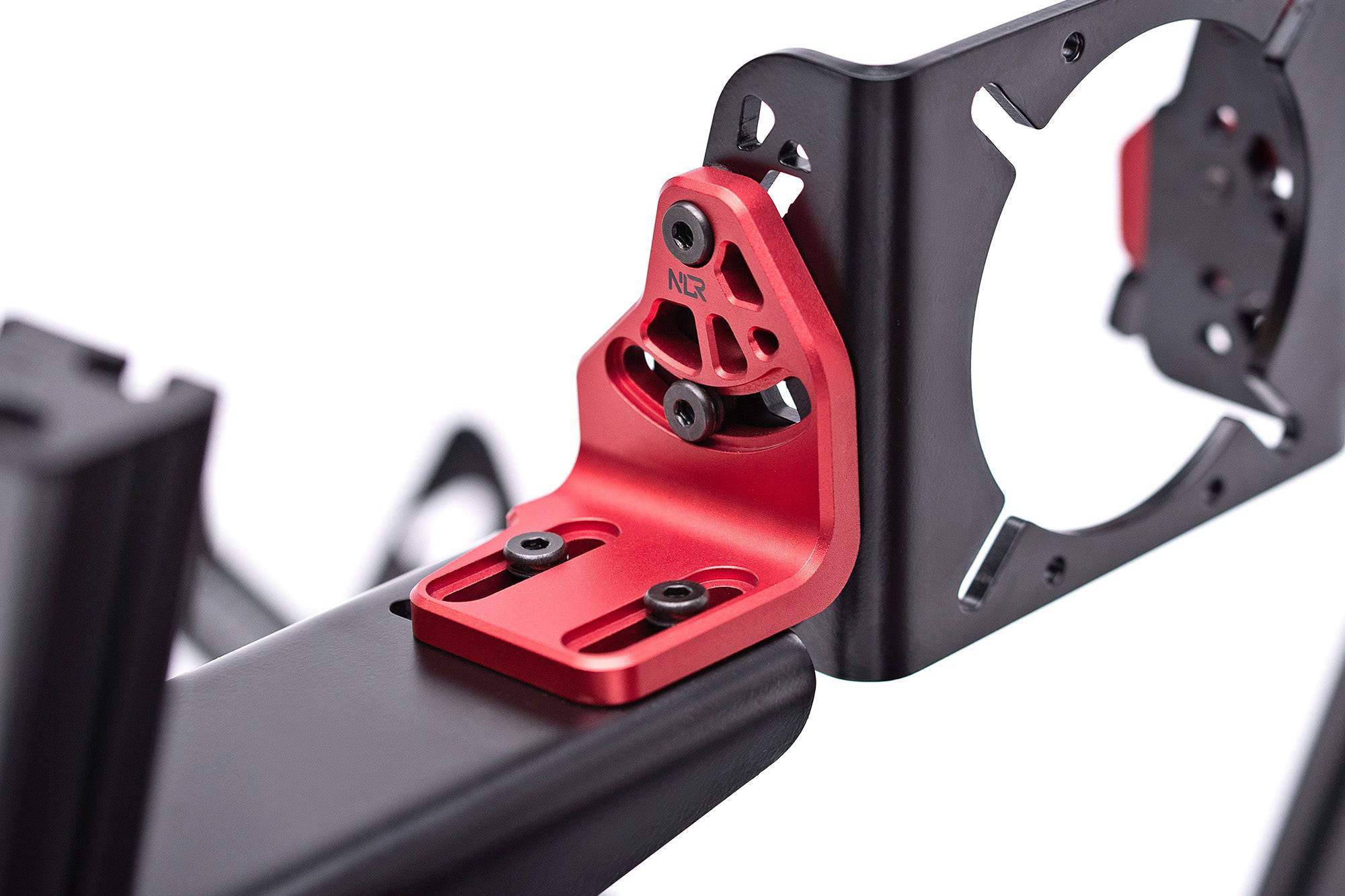 Next Level Racing Elite-DD side and front mount adaptor for racing simulator accessories, shown in black with mounting points.