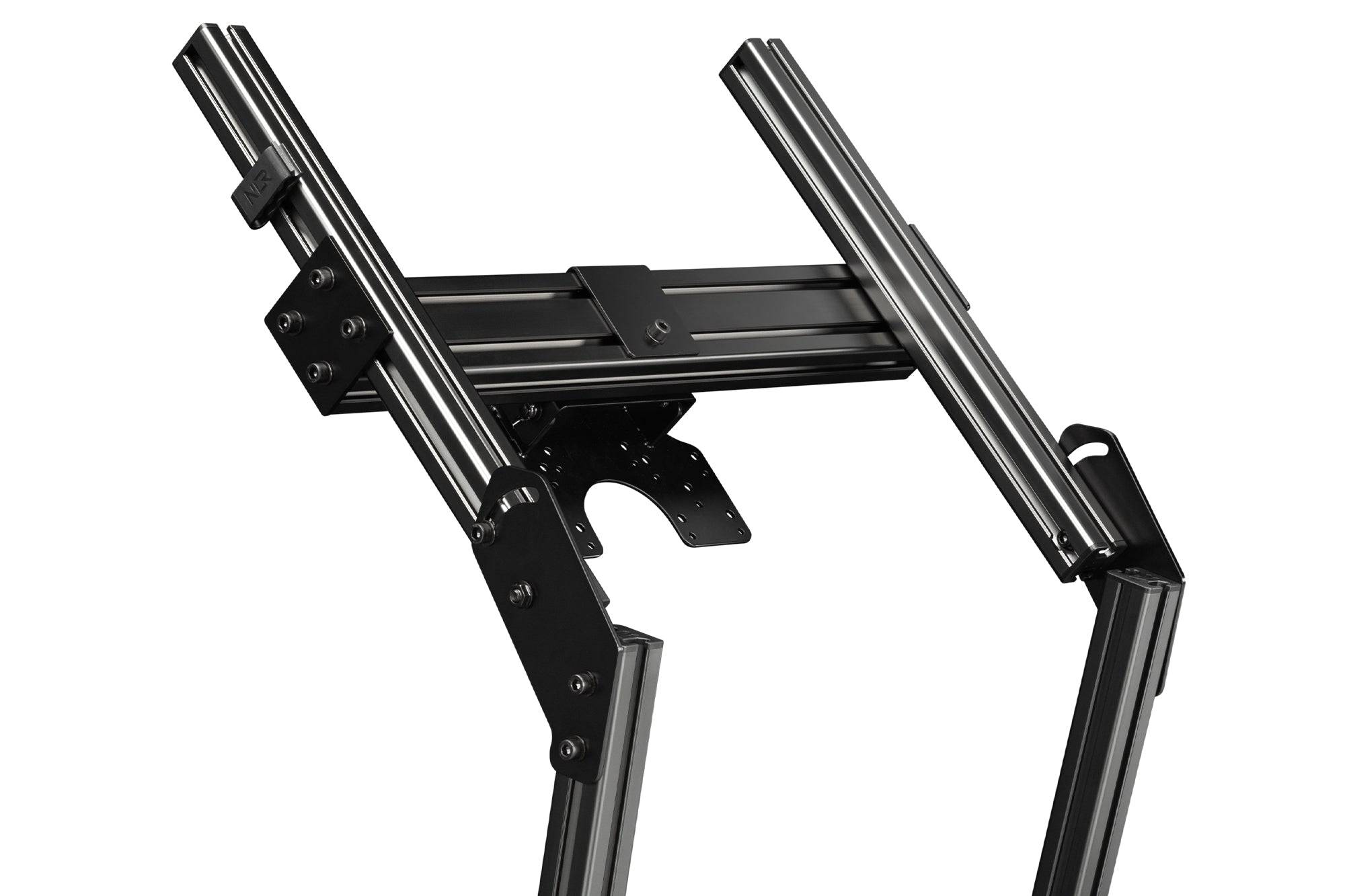 Next Level Racing Elite freestanding quad monitor stand in carbon grey holding four monitors for gaming or workstation setup.