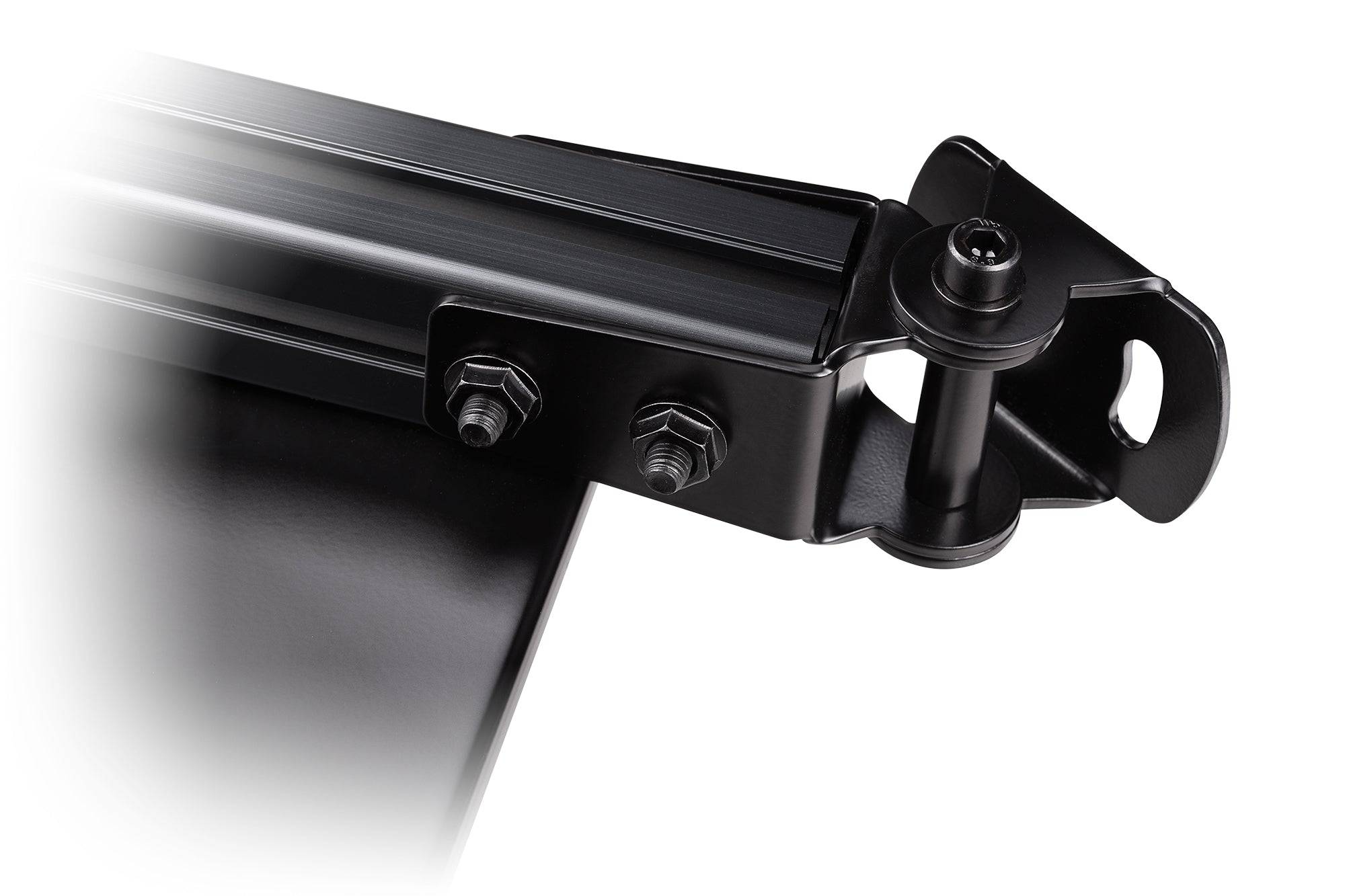 Next Level Racing F-GT Elite carbon grey keyboard and mouse tray for racing simulator accessories, with textured surface and adjustable design.