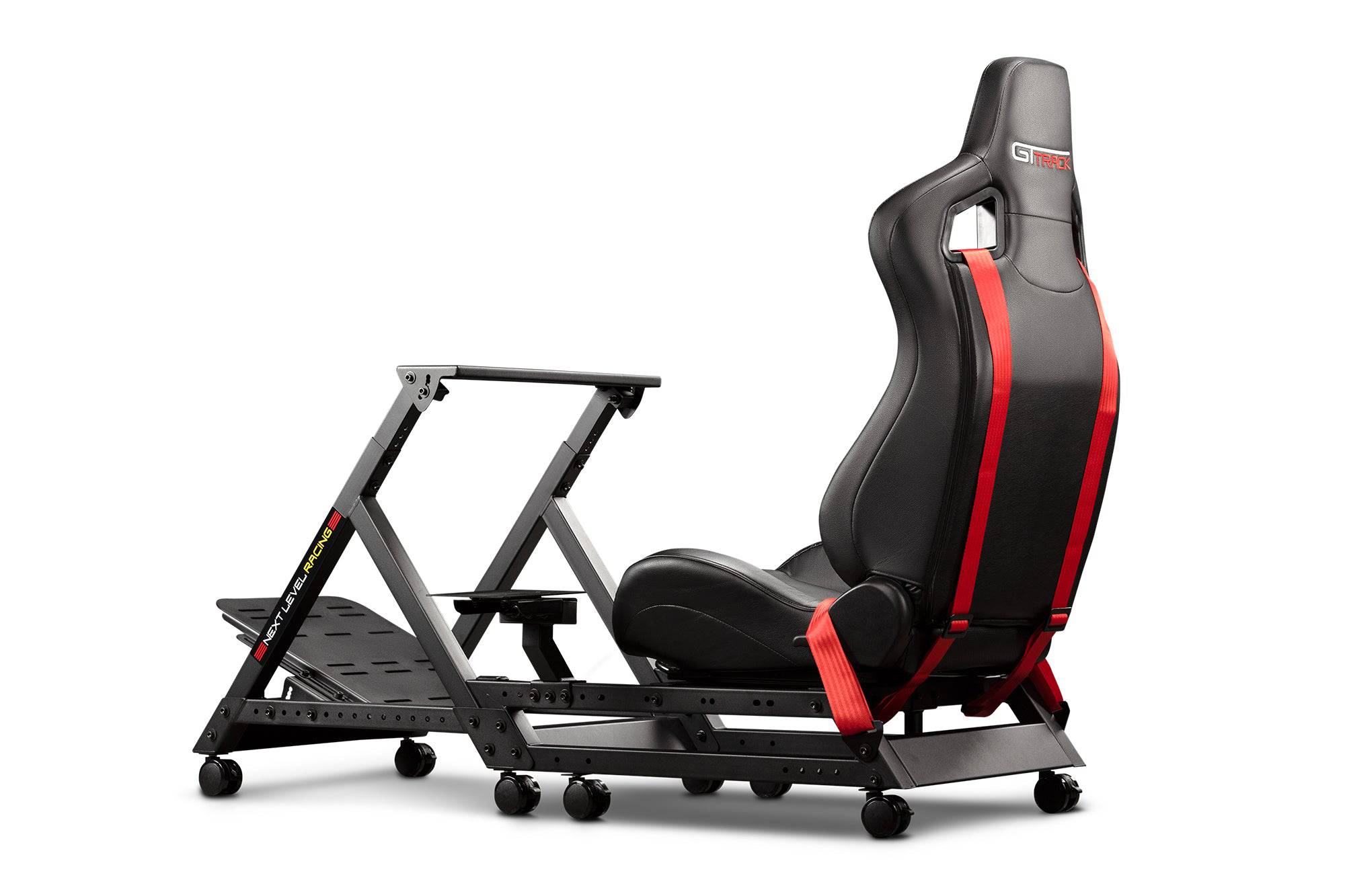 Next Level Racing GTtrack sim racing cockpit chassis with steering wheel mount and pedal setup for immersive racing simulations.