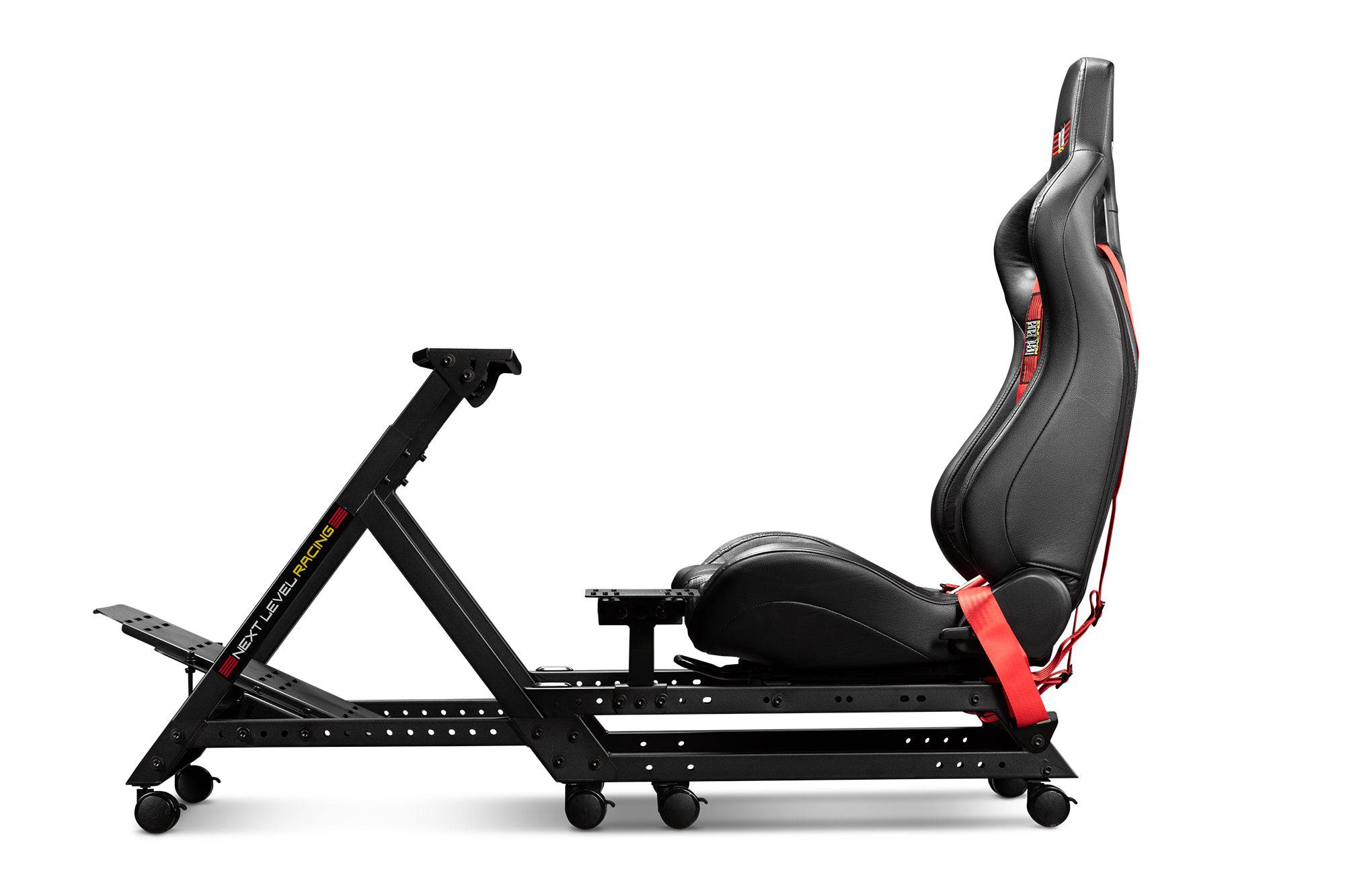 Next Level Racing GTtrack sim racing chassis with steering wheel and pedal mounts, designed for realistic racing simulation.