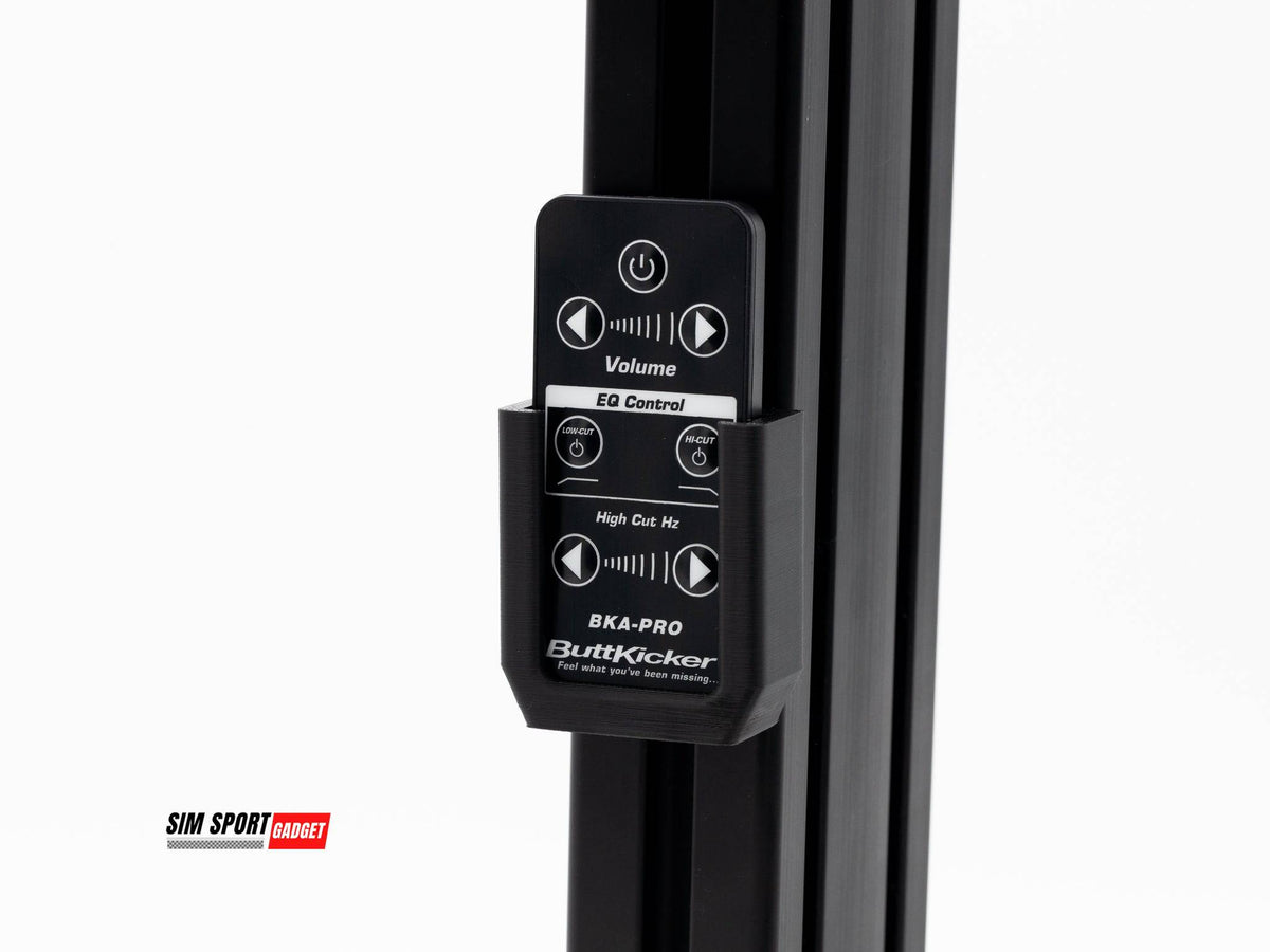 SimSportGadget Buttkicker wireless remote mount attached to a sim racing or flight rig for immersive vibration feedback accessories.